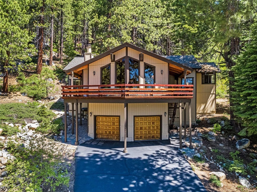 1004 Apollo Way Incline Village, NV 89451 - Photo 2 of 21 a front view of a house with yard