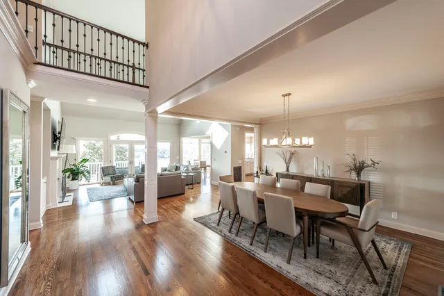 a kitchen with white cabinets and appliances