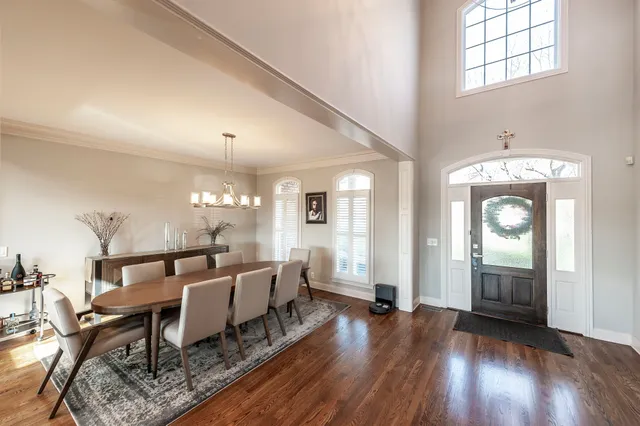 a kitchen with stainless steel appliances a refrigerator and a stove top oven