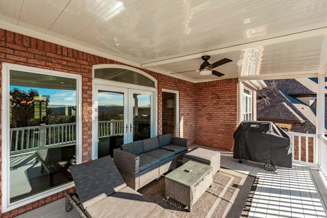 a bathroom with a sink toilet and a mirror