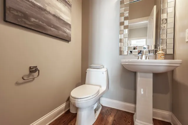 a view of a swimming pool with an outdoor seating and a yard