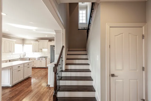 a view of a yard with large trees