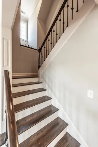 a view of a swimming pool with an outdoor space and seating area