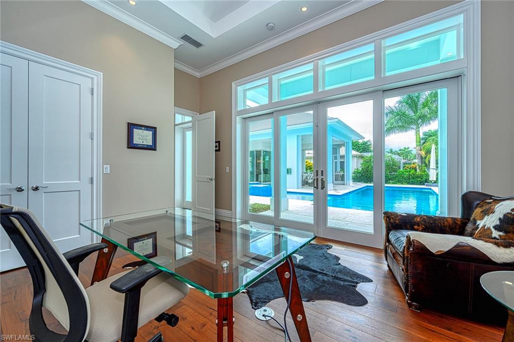 655 Riviera Drive Naples, FL 34103 - Photo 15 of 34 Cabana out to pool!