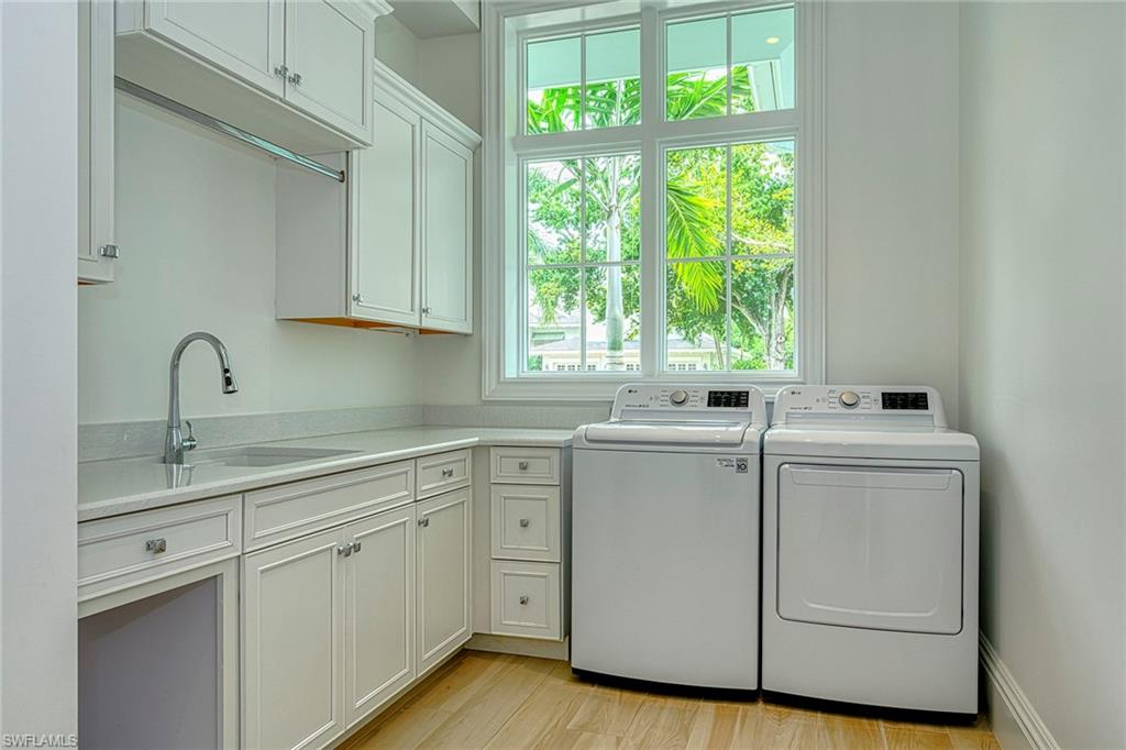 655 Riviera Drive Naples, FL 34103 - Photo 25 of 34 Generous Laundry room with laundry chute from upstairs bedrooms!