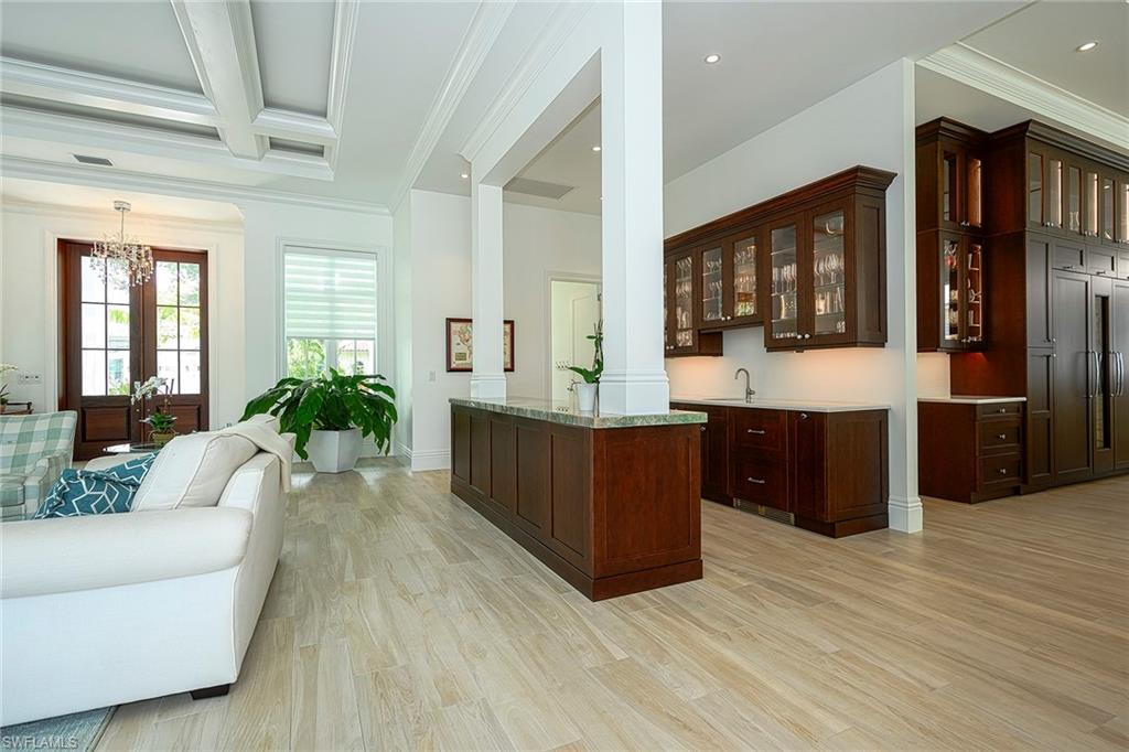 655 Riviera Drive Naples, FL 34103 - Photo 3 of 34 Centrally located bar in Great room - Great for entertaining