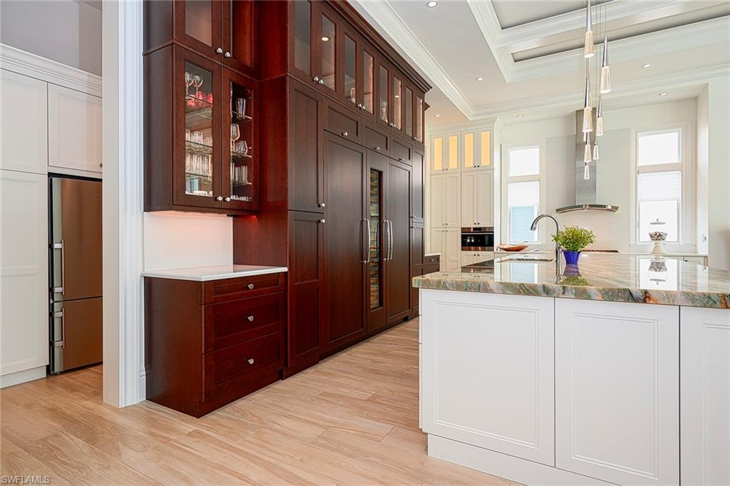655 Riviera Drive Naples, FL 34103 - Photo 6 of 34 Oversized Kitchen with walk in butlers pantry, extra refrigerator, and wine cooler!