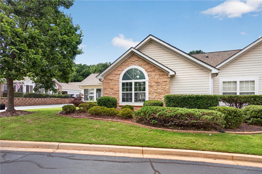 134 Life Style Lane Anderson, SC 29621 - Photo 31 of 44 A well-maintained facade showcasing architectural details and mature landscaping.