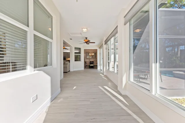 a bathroom with a double vanity sink mirror and shower