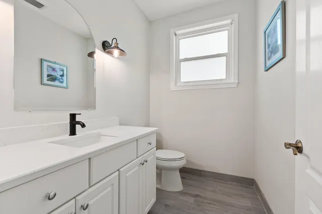 a utility room with cabinets