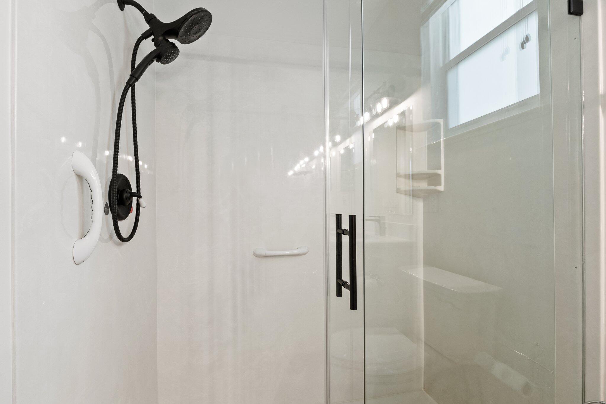 1680 Southeast Cypress Glen Way Stuart, FL 34997 - Photo 37 of 76 a bathroom with a shower