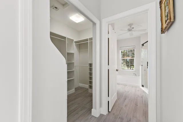 a view of a house with a yard and street view