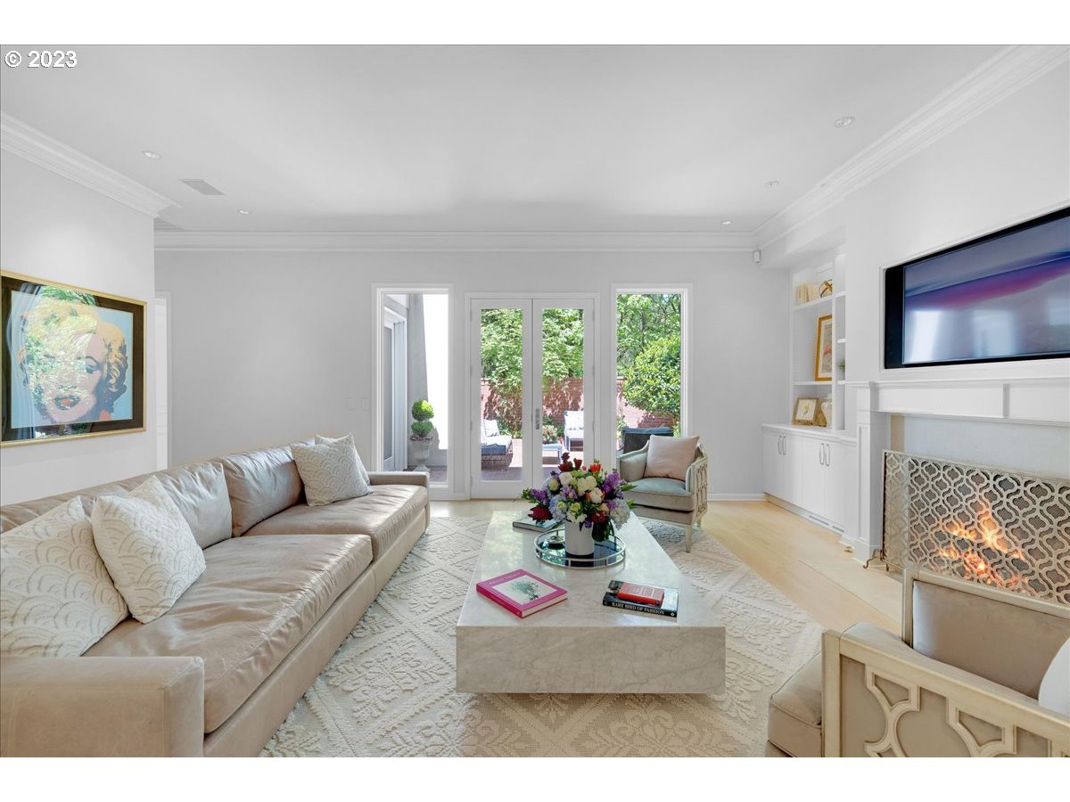 554 Southwest 48th Drive Portland, OR 97221 - Photo 17 of 48 a living room with furniture fireplace and a large window
