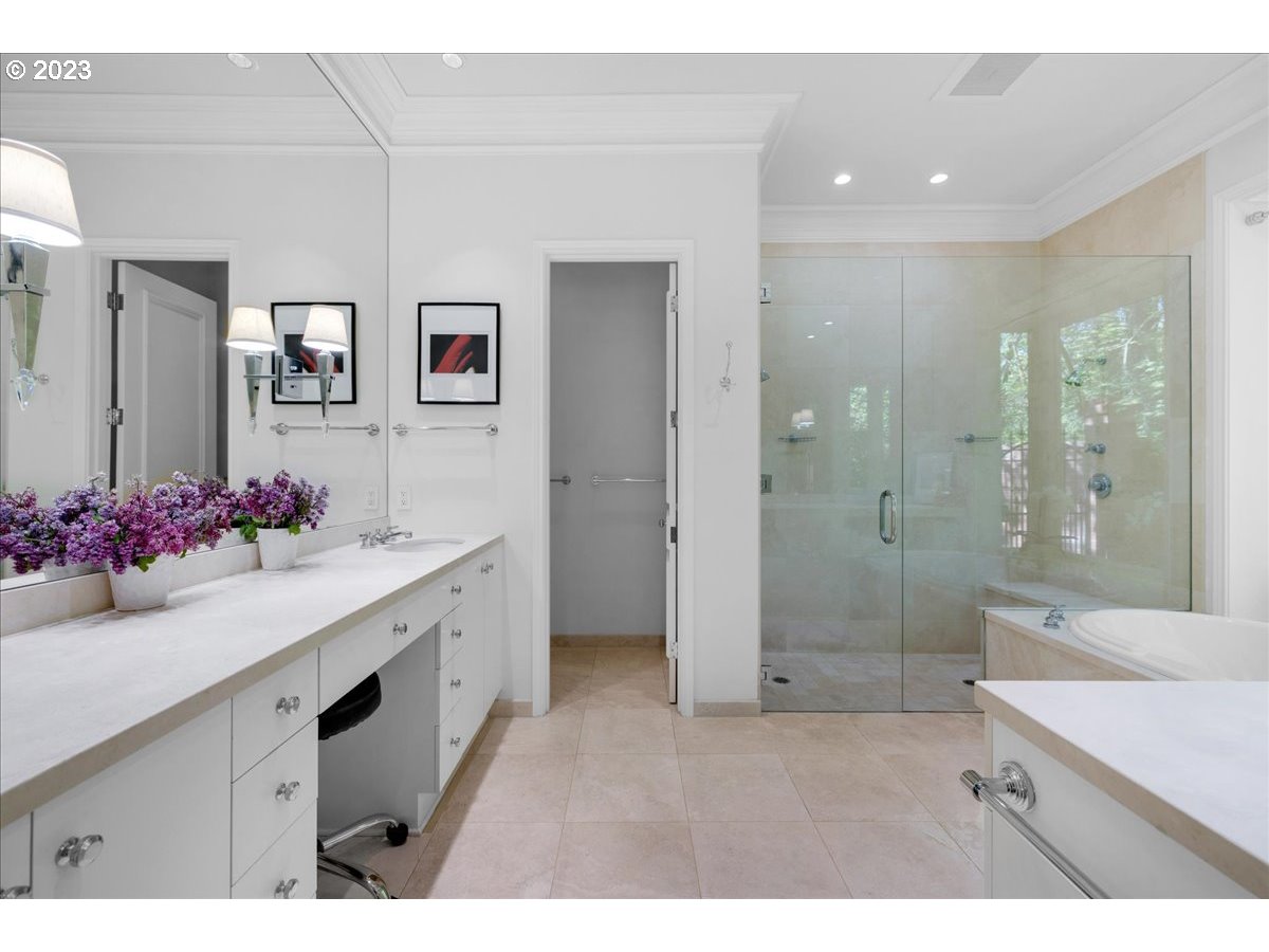 554 Southwest 48th Drive Portland, OR 97221 - Photo 25 of 48 a bathroom with a shower sink vanity and mirror
