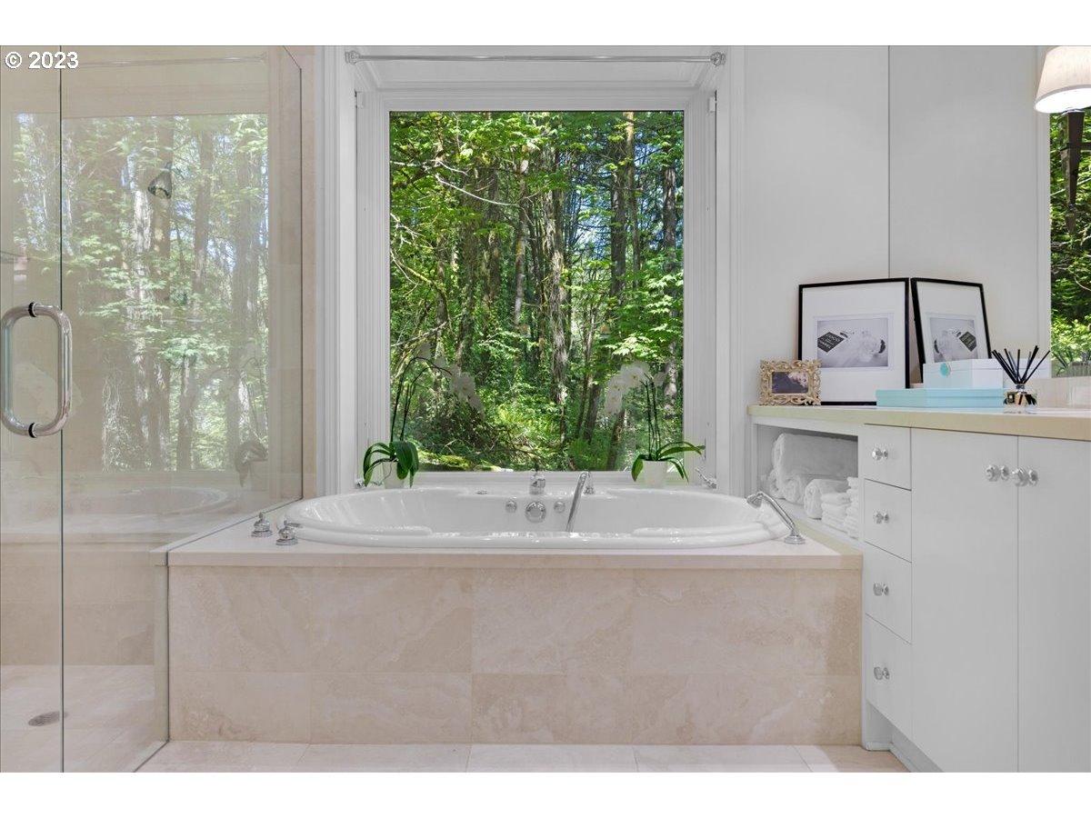 554 Southwest 48th Drive Portland, OR 97221 - Photo 27 of 48 a bathroom with a sink and a mirror