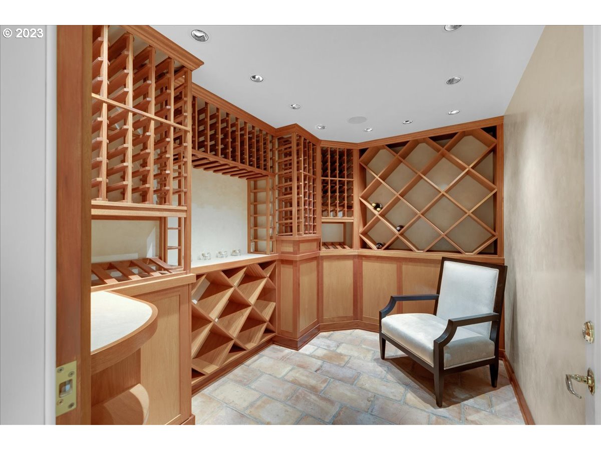 554 Southwest 48th Drive Portland, OR 97221 - Photo 37 of 48 a living room with a couch and chandelier