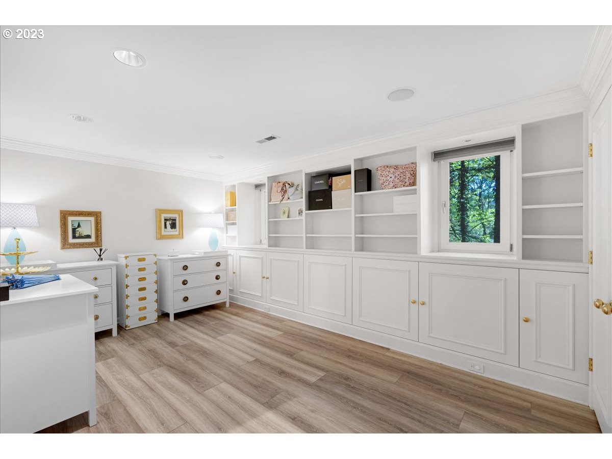 554 Southwest 48th Drive Portland, OR 97221 - Photo 39 of 48 a view of workspace with wooden floor and window