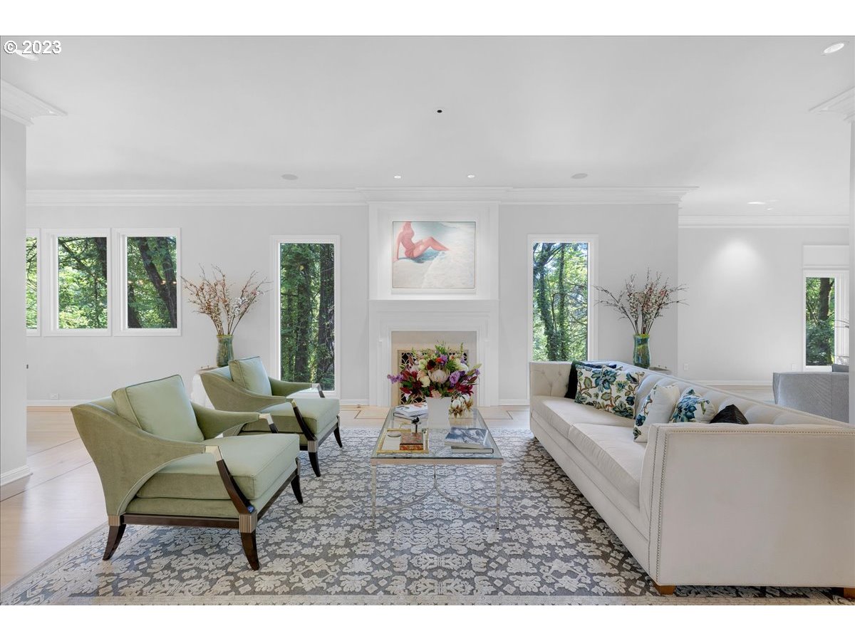 554 Southwest 48th Drive Portland, OR 97221 - Photo 4 of 48 a living room with furniture and a fireplace