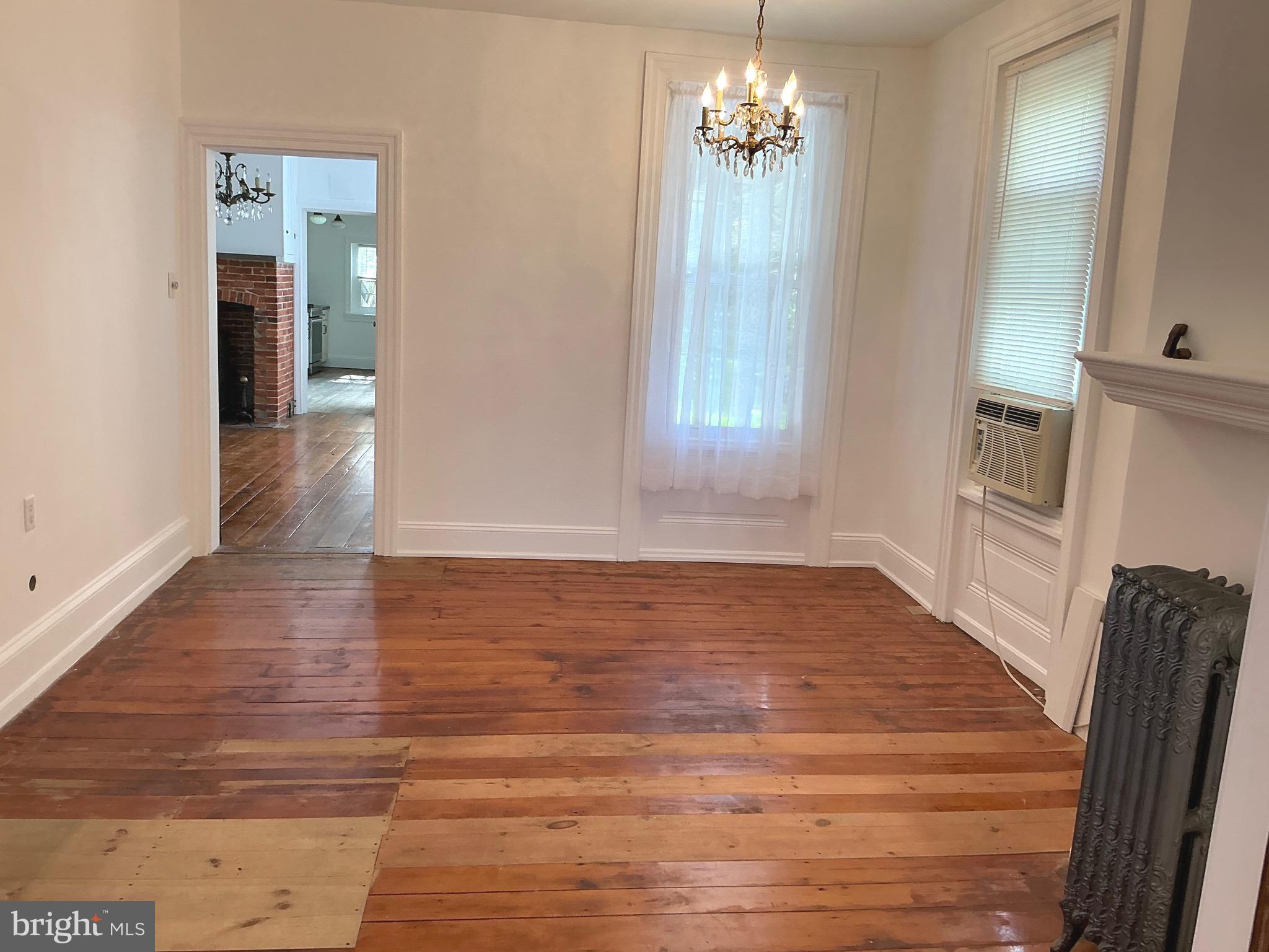 30 South Village Avenue Exton, PA 19341 - Photo 17 of 31 a view of livingroom with hardwood floor and kitchen