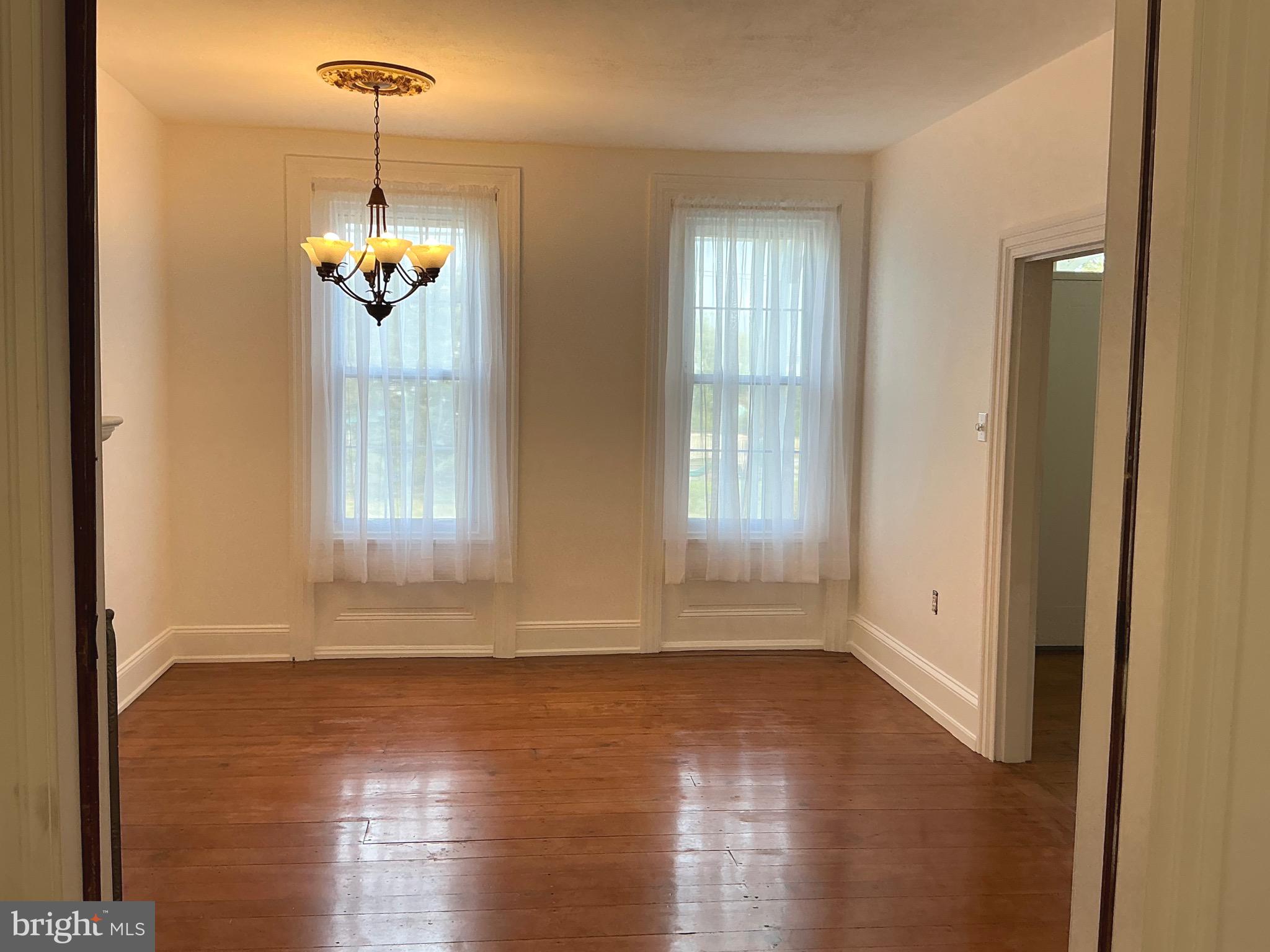 30 South Village Avenue Exton, PA 19341 - Photo 19 of 31 a view of a room with wooden floor and window
