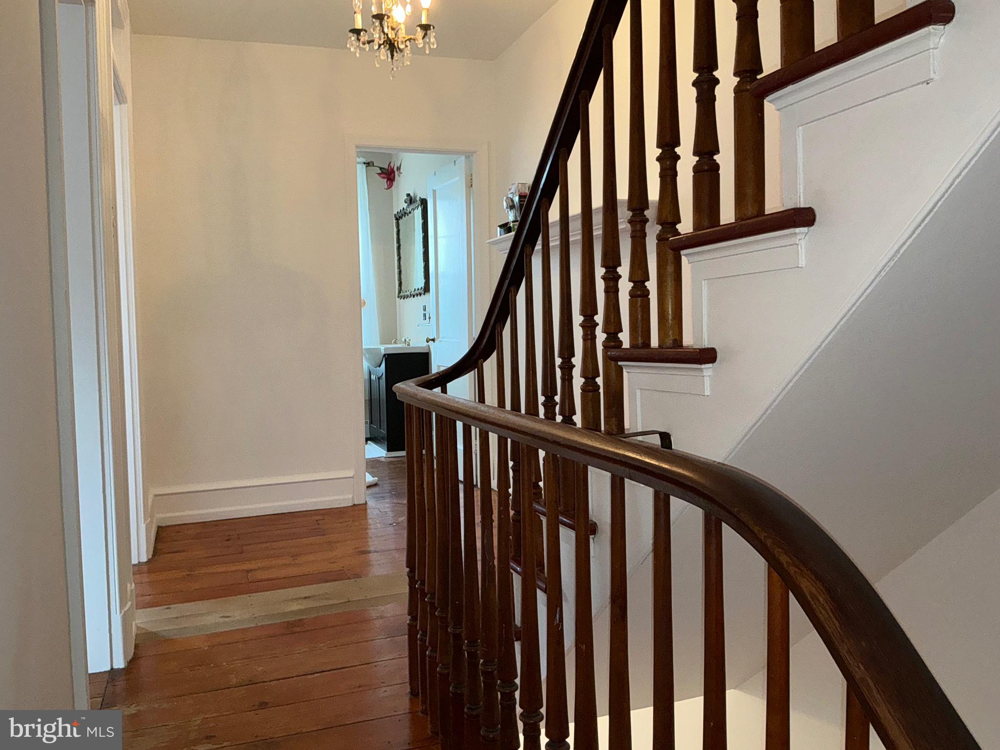 30 South Village Avenue Exton, PA 19341 - Photo 27 of 31 a view of staircase with wooden floor and white walls