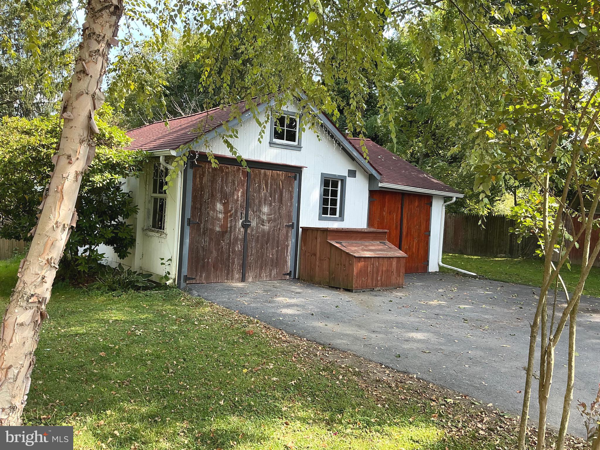 30 South Village Avenue Exton, PA 19341 - Photo 8 of 31 a view of a house with a yard and a large tree