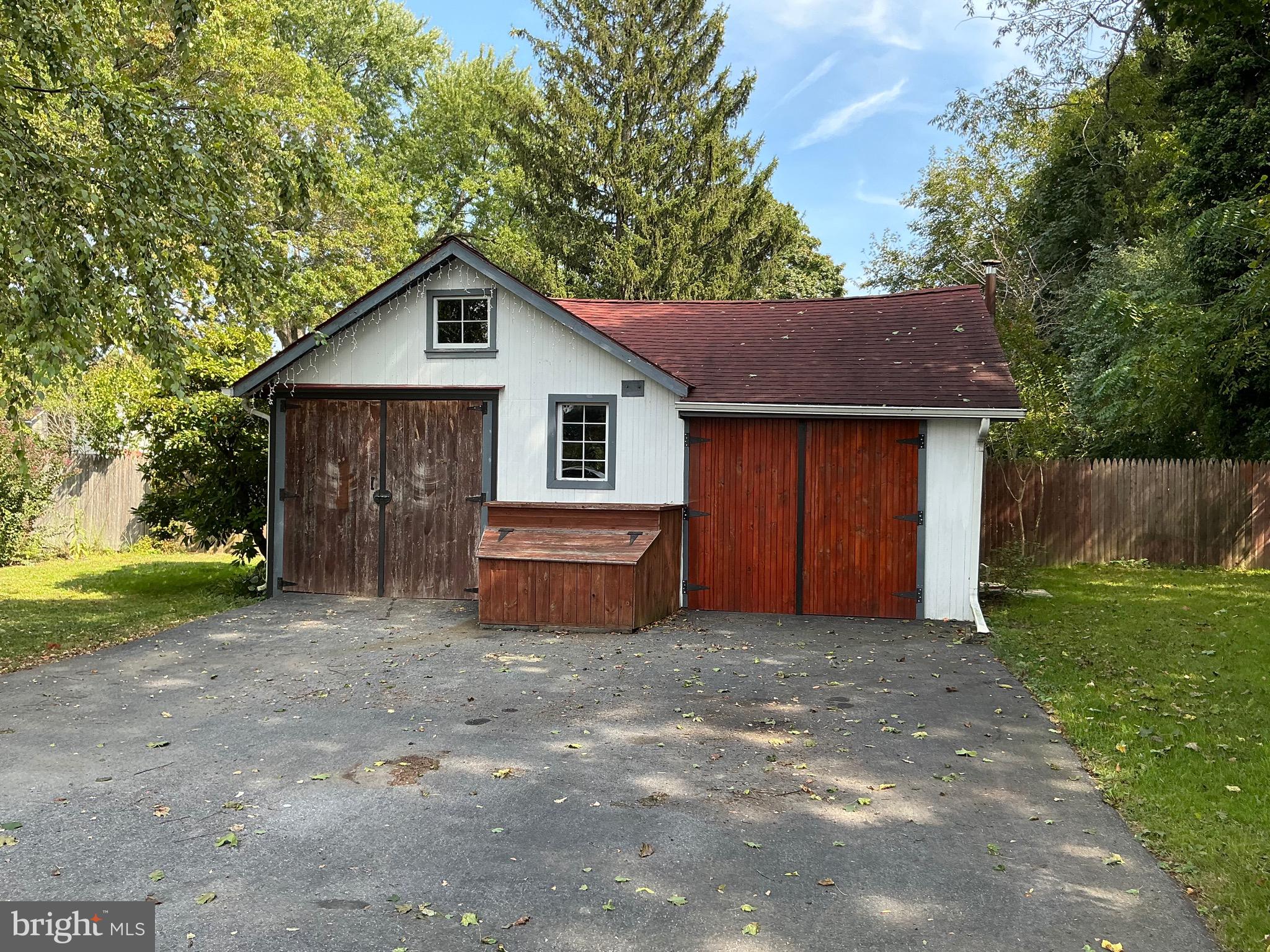 30 South Village Avenue Exton, PA 19341 - Photo 9 of 31 a front view of house with yard and trees all around