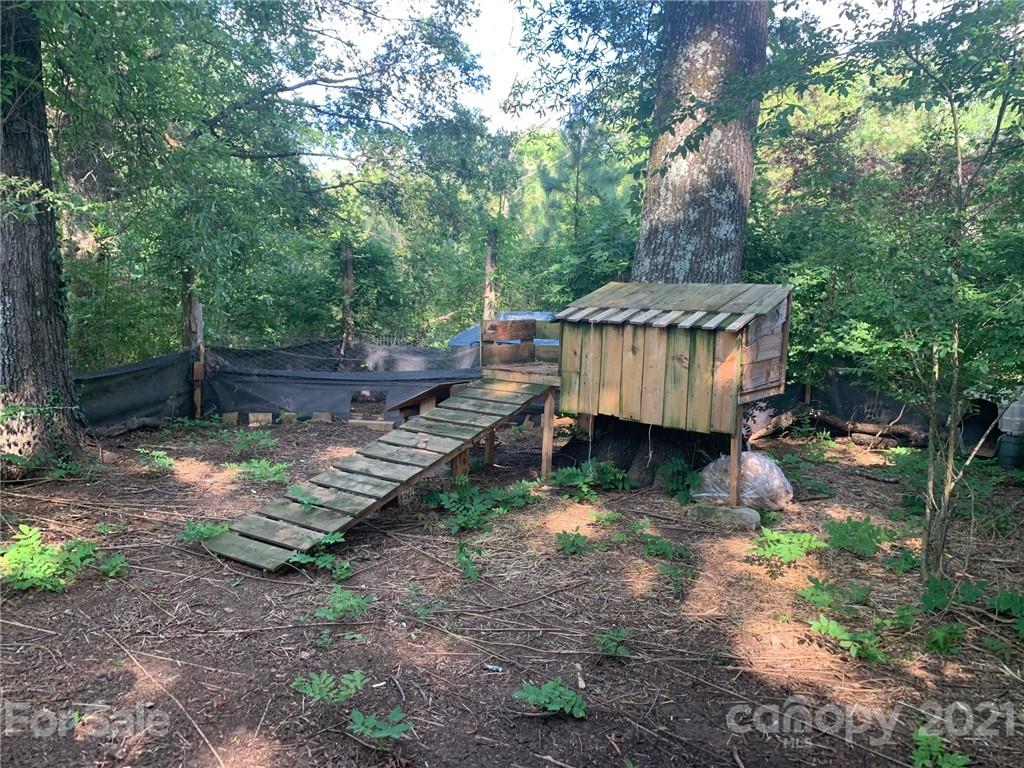 887 Meadowbrook Road, Unit 3 Chester, SC 29706 - Photo 13 of 15 a view of a backyard with trees