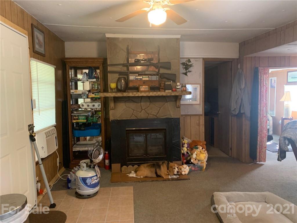 887 Meadowbrook Road, Unit 3 Chester, SC 29706 - Photo 6 of 15 a living room with furniture and a fireplace