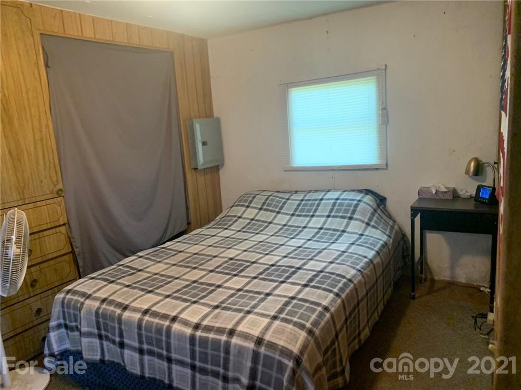 887 Meadowbrook Road, Unit 3 Chester, SC 29706 - Photo 7 of 15 a bedroom with a bed and a window