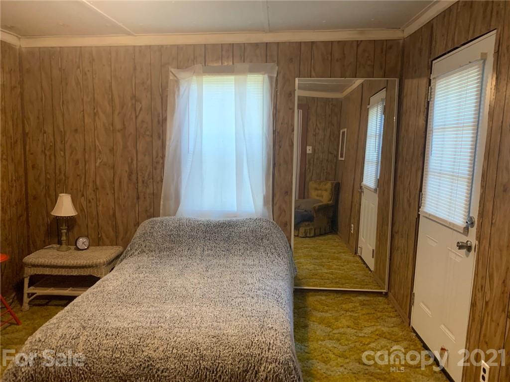 887 Meadowbrook Road, Unit 3 Chester, SC 29706 - Photo 9 of 15 a bedroom with a bed and a shower