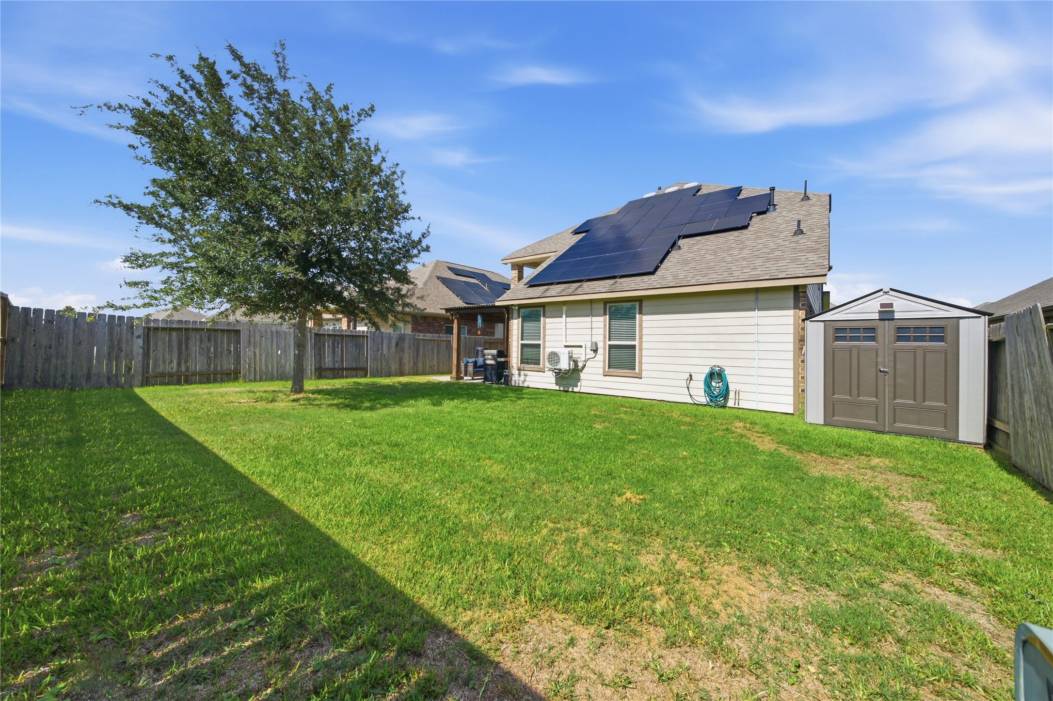 234 Dale Ridge Lane Dickinson, TX 77539 - Photo 28 of 31 Backyard has a storage shed.