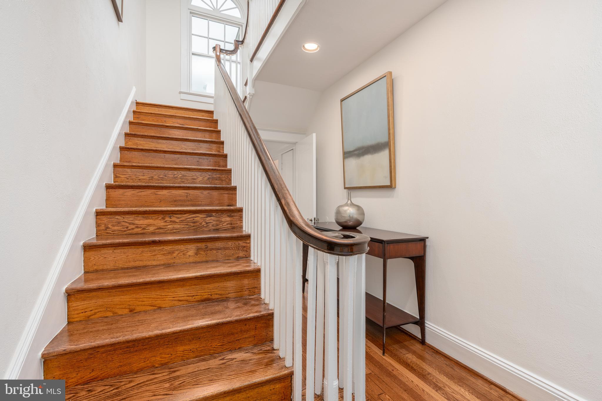 5045 Reno Road Northwest Washington, DC 20008 - Photo 42 of 65 Grand staircase w/ landing to upper level