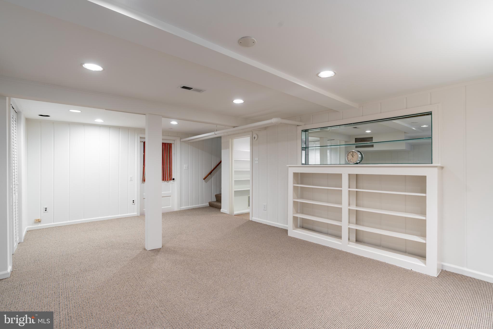 5045 Reno Road Northwest Washington, DC 20008 - Photo 57 of 65 Basement family room w/ built-ins