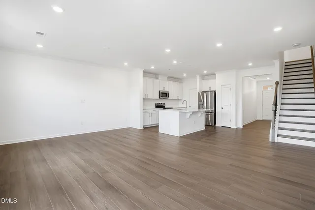 a view of kitchen with wooden floor