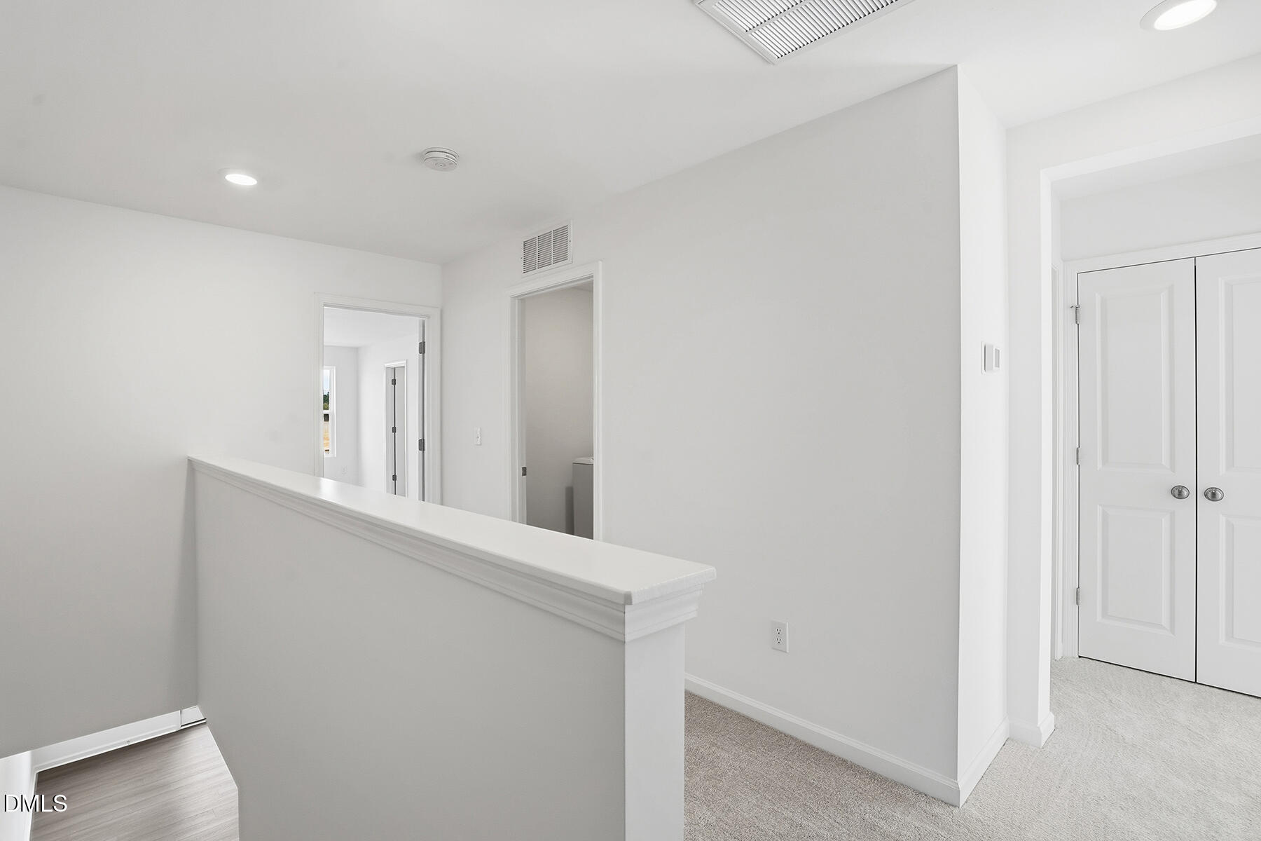 84 Blossom Fld Way Angier, NC 27501 - Photo 16 of 30 a view of a hallway with a white stove