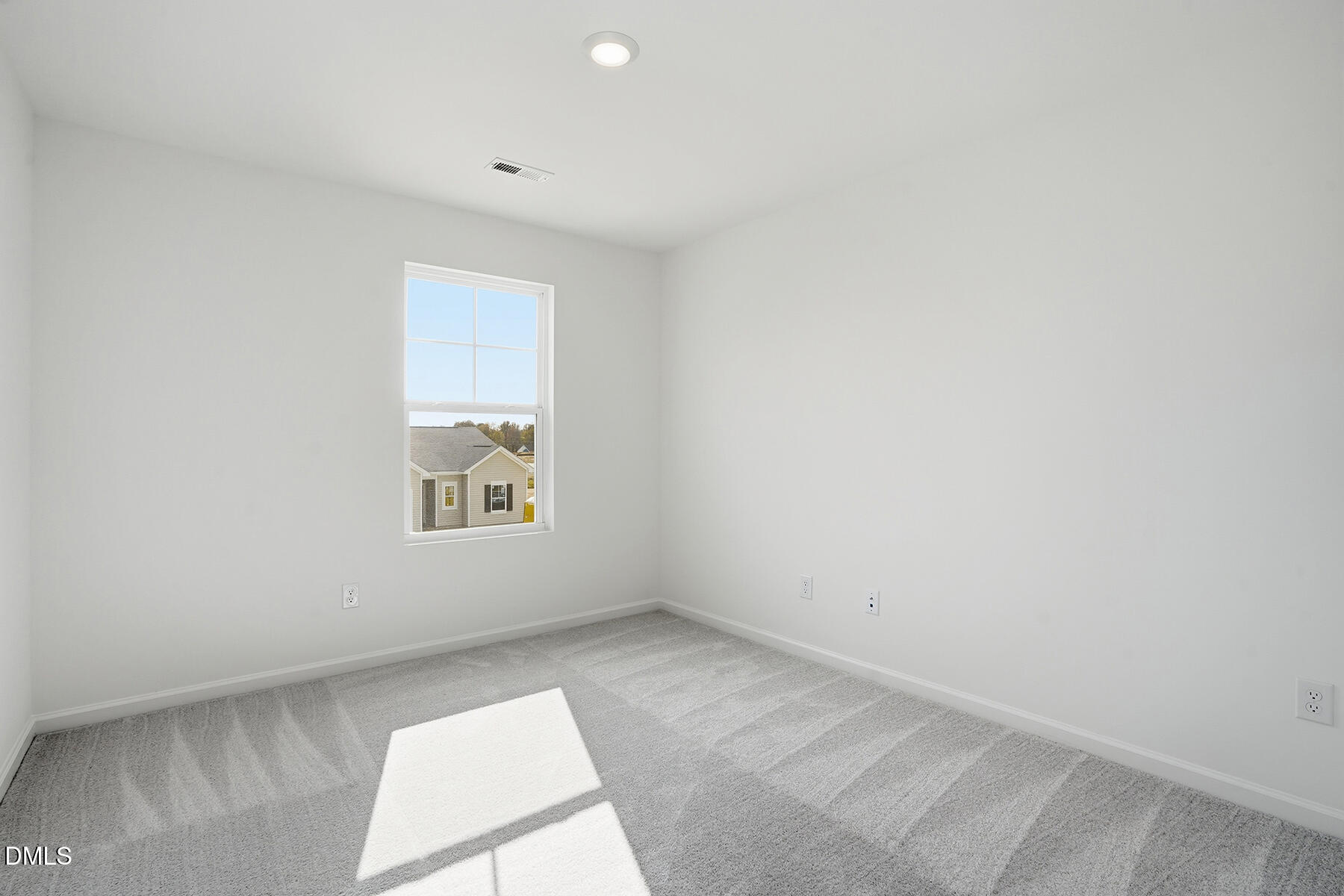 84 Blossom Fld Way Angier, NC 27501 - Photo 17 of 30 an empty room with a window