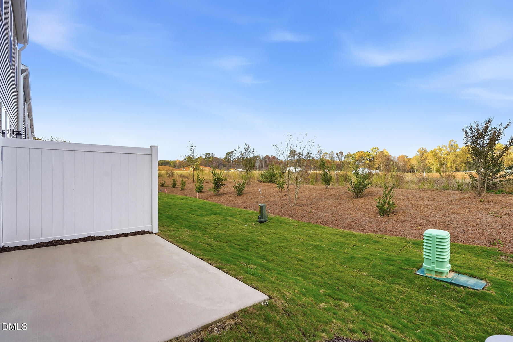 84 Blossom Fld Way Angier, NC 27501 - Photo 30 of 30 a view of a golf course with a lake