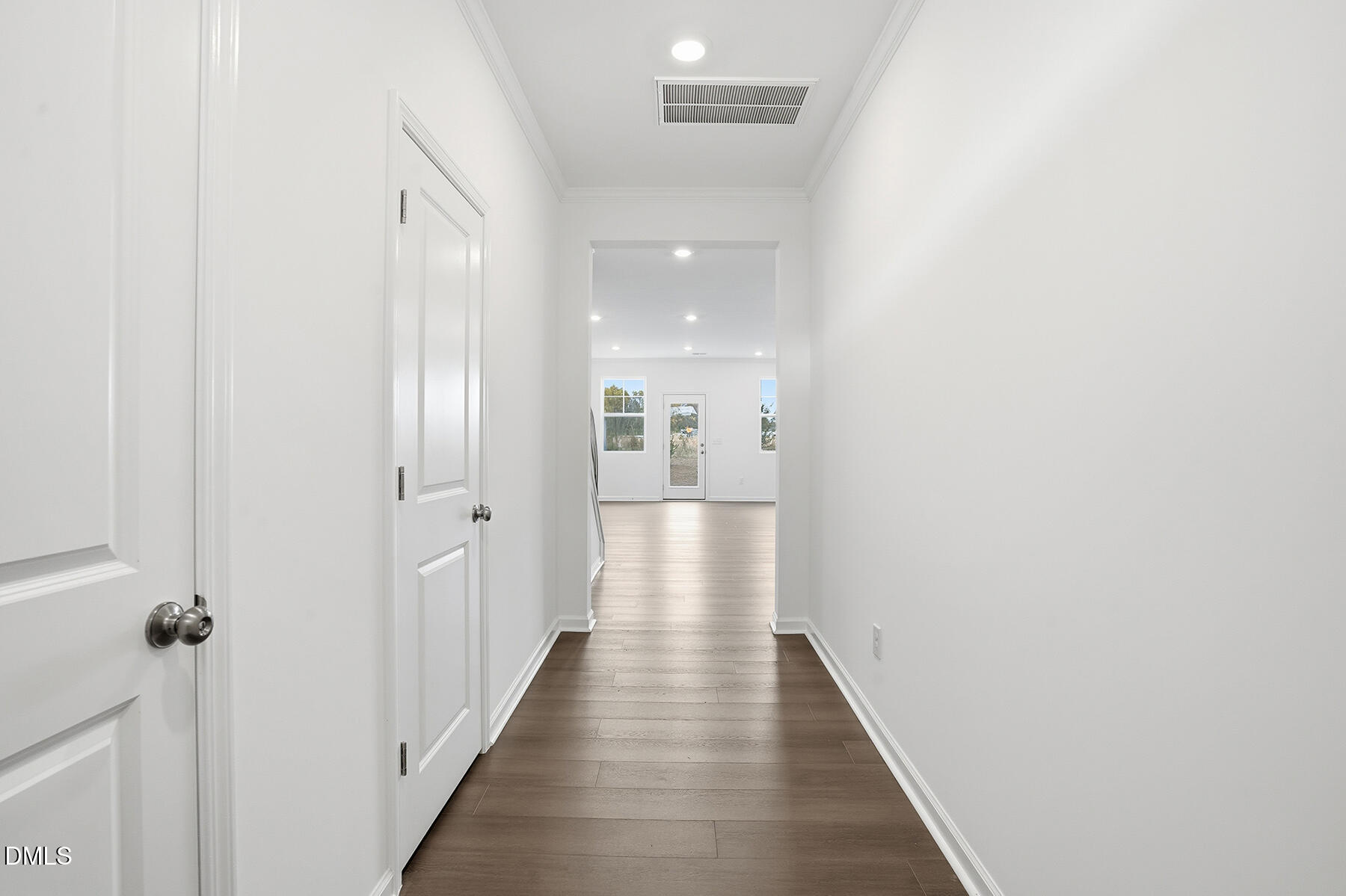 84 Blossom Fld Way Angier, NC 27501 - Photo 4 of 30 a view of a hallway with wooden floor