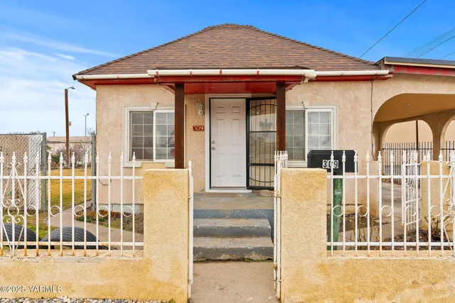 a front view of a house with a balcony
