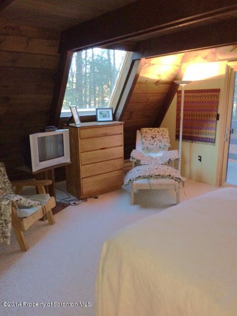 Whengreen Road Nicholson, PA 18446 - Photo 13 of 24 a bedroom with a bed and a window