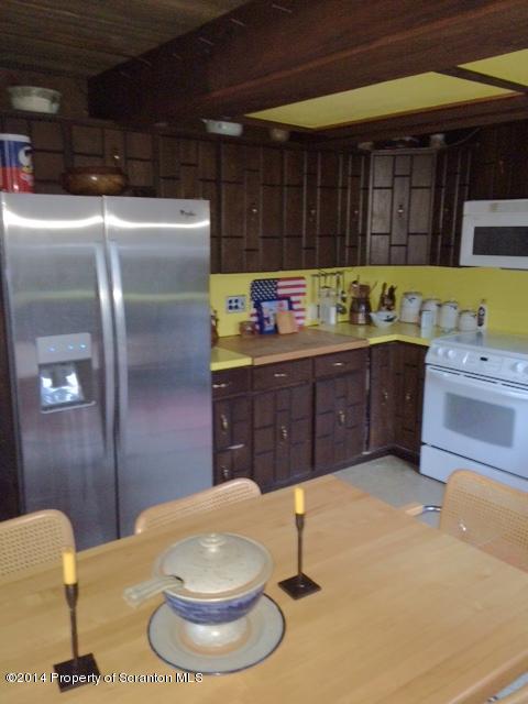 Whengreen Road Nicholson, PA 18446 - Photo 2 of 24 a kitchen with a sink and cabinets