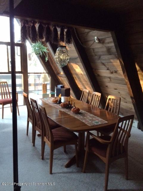 Whengreen Road Nicholson, PA 18446 - Photo 5 of 24 a view of a dining room with furniture a chandelier and wooden floor