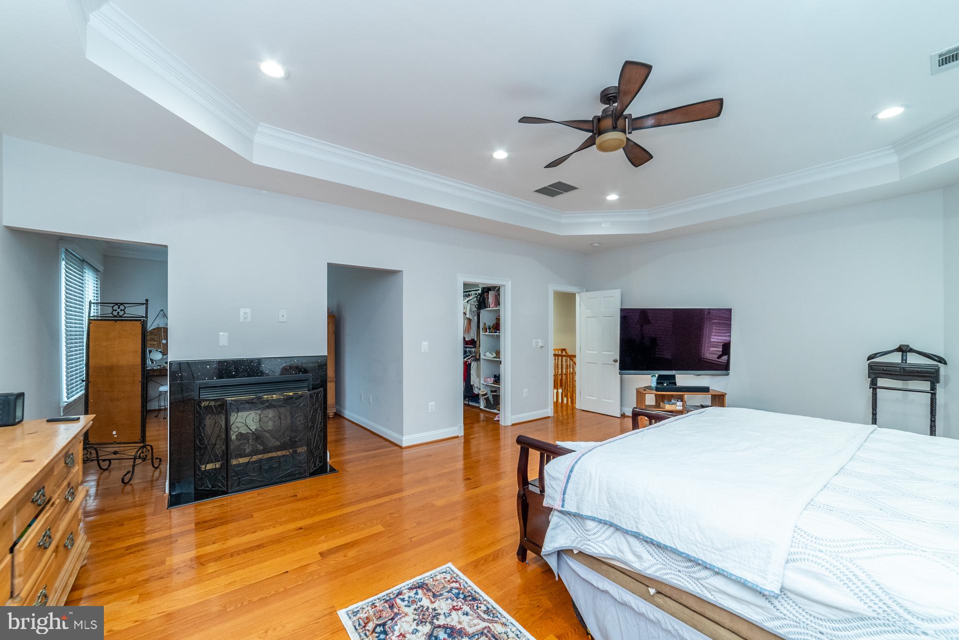 7413 Gresham Street Springfield, VA 22151 - Photo 34 of 55 MASTER BEDROOM WITH 2-SIDED FIREPLACE