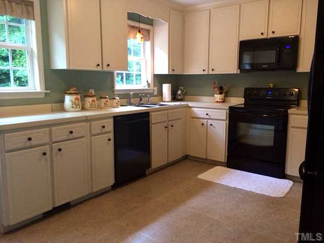 1487 Lee Road Clayton, NC 27520 - Photo 10 of 22 Spacious countertops for cooking a 4 course meal