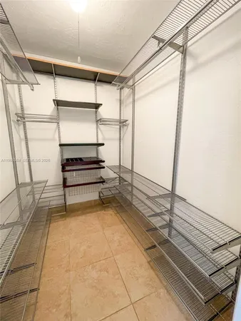 a view of a room with racks on the wall