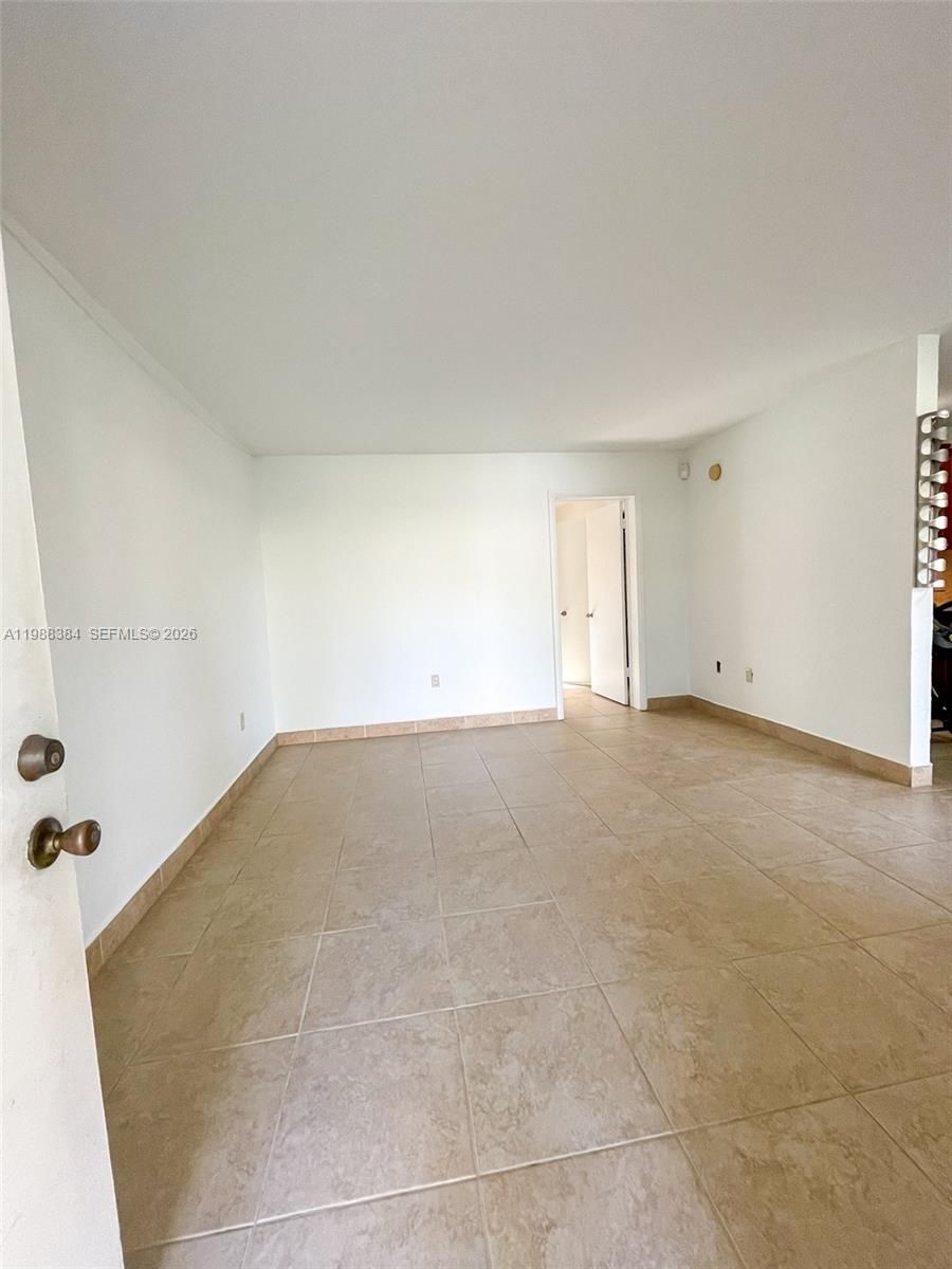 4450 Southwest 67th Avenue, Unit I Miami, FL 33155 - Photo 6 of 12 a view of empty room