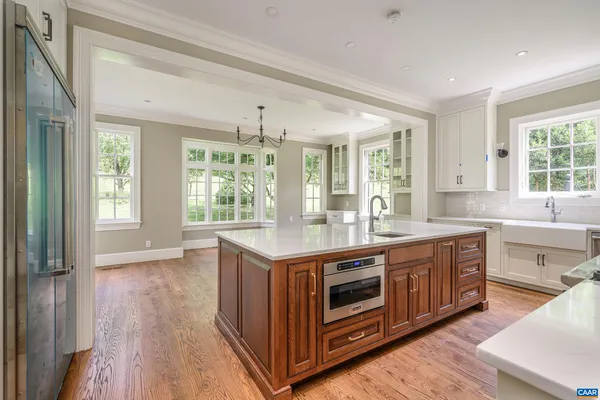 a kitchen with stainless steel appliances granite countertop a stove and a sink