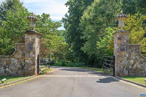 a view of outdoor space with deck and yard