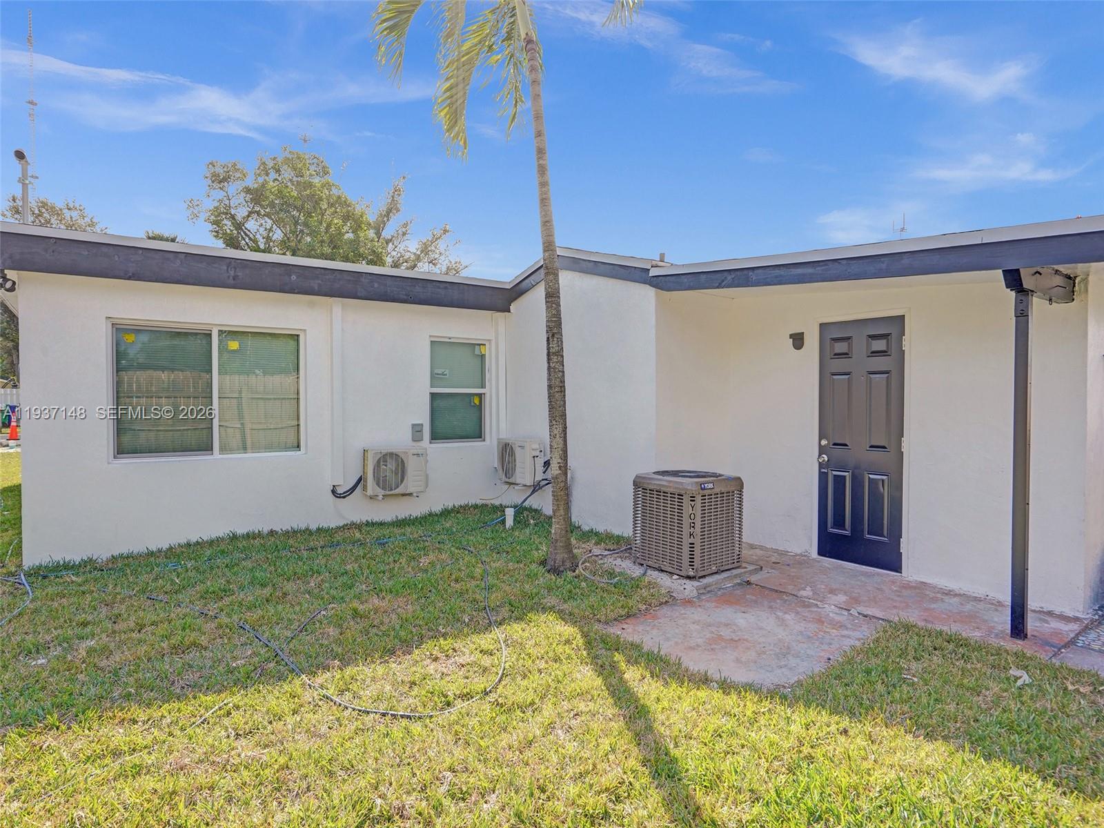 6143 Southwest 40th Street Miramar, FL 33023 - Photo 23 of 24 a backyard of a house with seating space